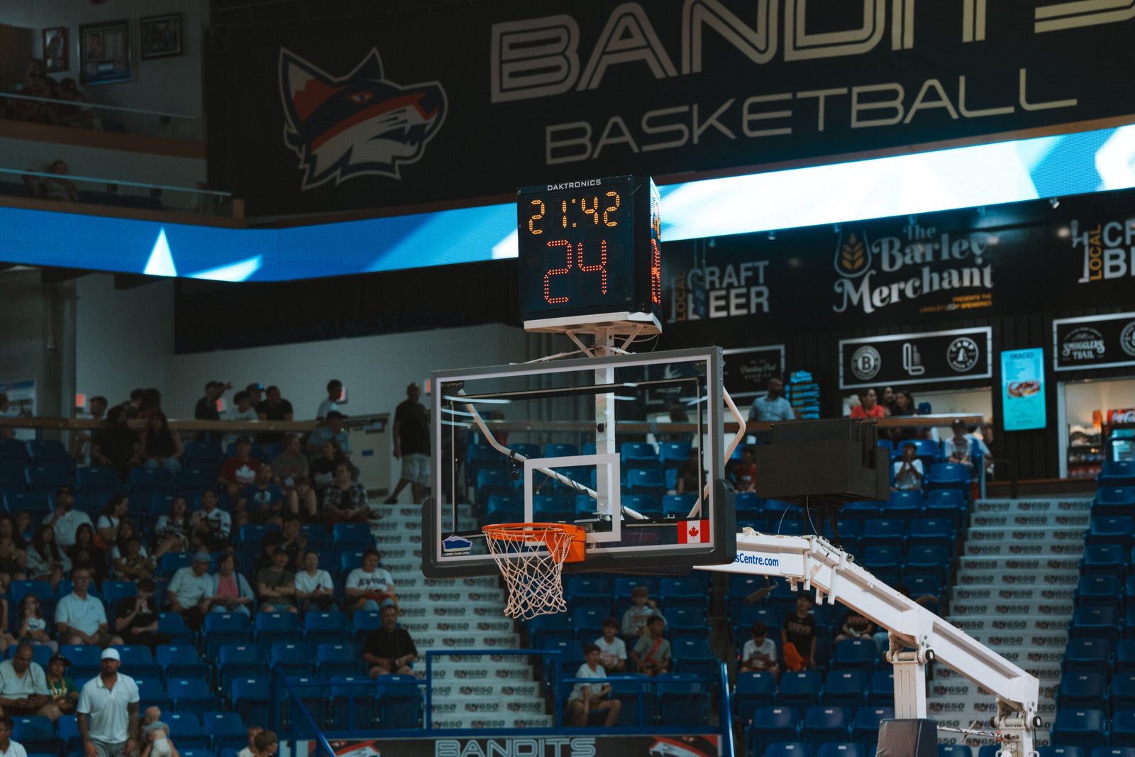 A packed indoor basketball arena with the scoreboard lit — the stage awaiting the retooled Philadelphia 76ers roster in 2026-27 (Photo: Pexels)