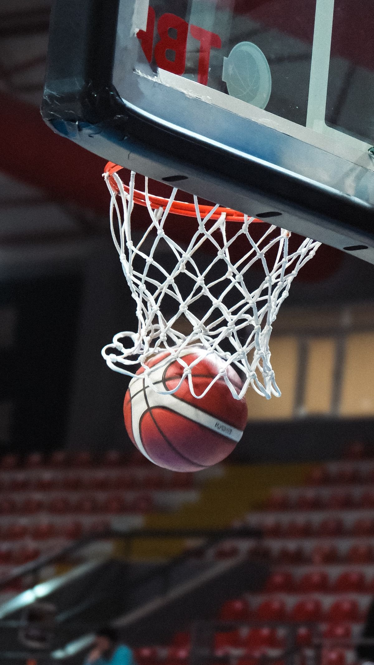Basketball swishing through the net