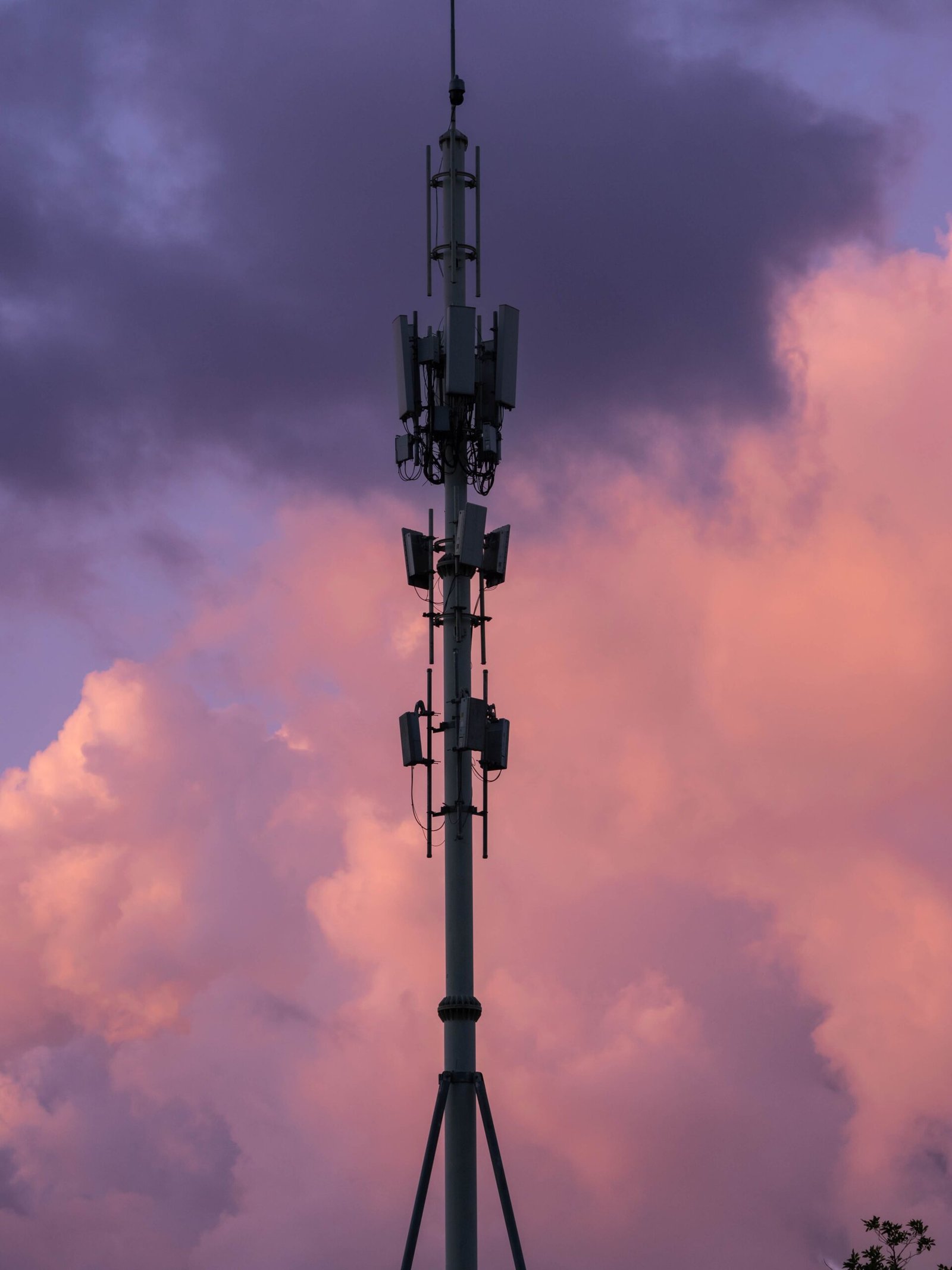 Cell tower against the sky, representing wireless network infrastructure