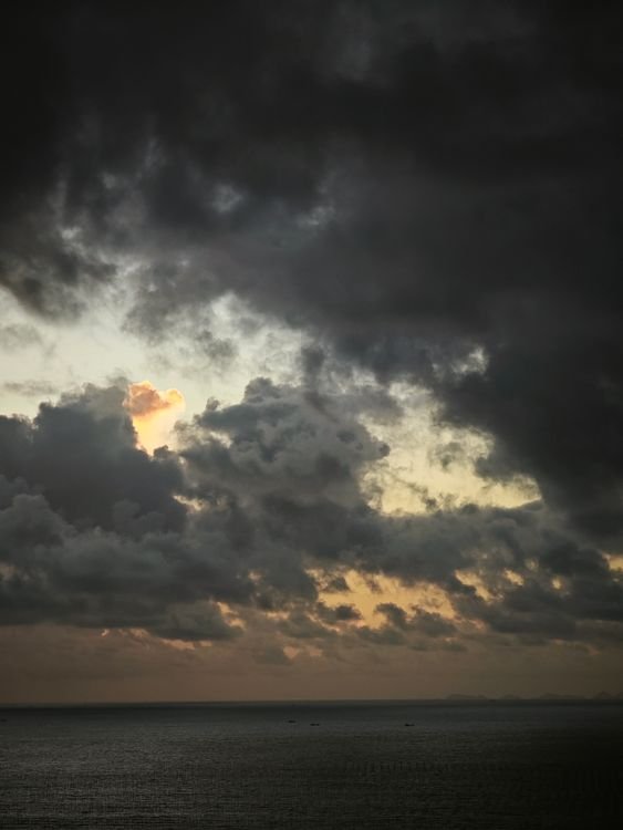 Dramatic storm clouds over the ocean