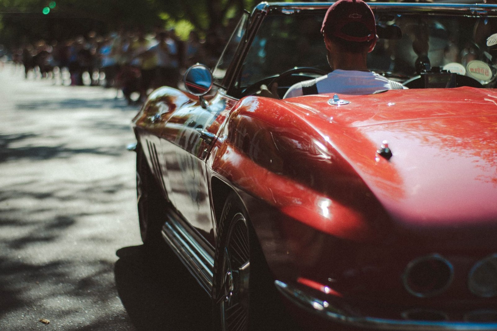Classic and modern muscle cars lined up along Woodward Avenue during Dream Cruise Week